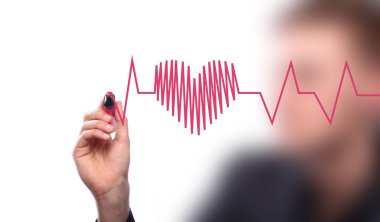 İşadamı işaretli kalp atışı grafiği gösteriyor