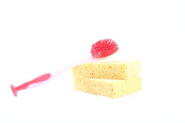 Beyaz arka planda bezler ve diş fırçası 