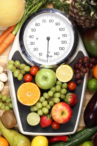 Different organic food on weight scale