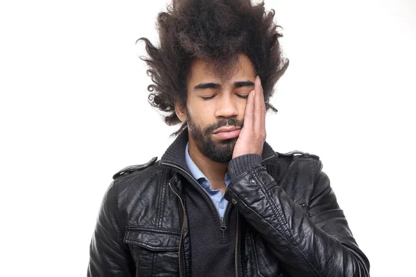 Sleeping black man on white background