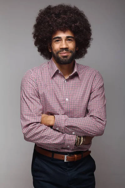 Happy black man with big hair - Stock Image - Everypixel