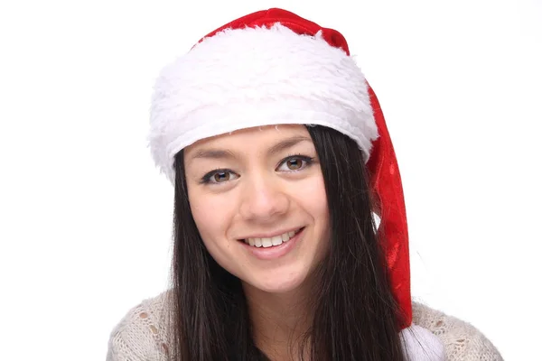 幸せな若いアジア女の子はクリスマスの帽子を着ています — ストック写真