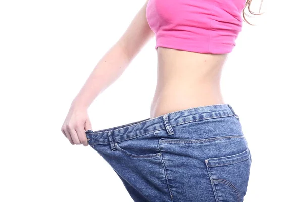 Kaukasische Slim Meisje Poseren Grote Jeans — Stockfoto