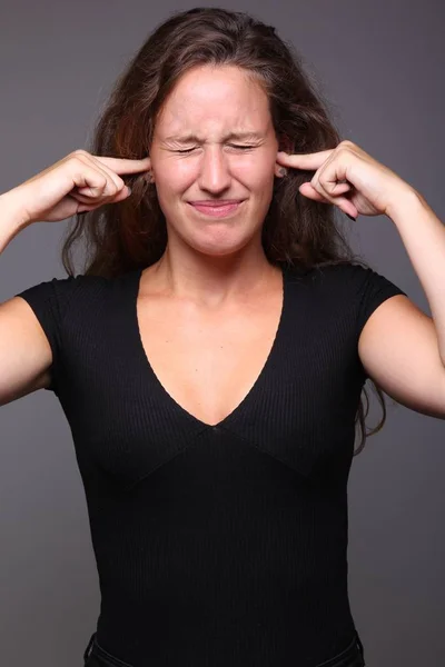 Beautiful Caucasian Woman Covering Her Ears — Stock Photo, Image