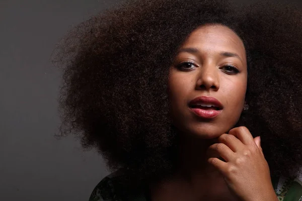 Beautiful afro-american woman is serious