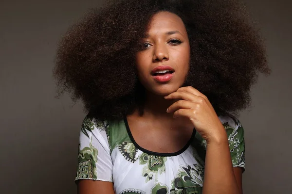 Beautiful afro-american woman is serious
