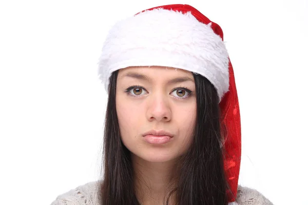 重大なアジア人の少女はクリスマスの帽子を着ています — ストック写真