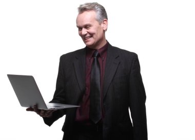 Dizüstü bilgisayar ile beyaz eski işadamı