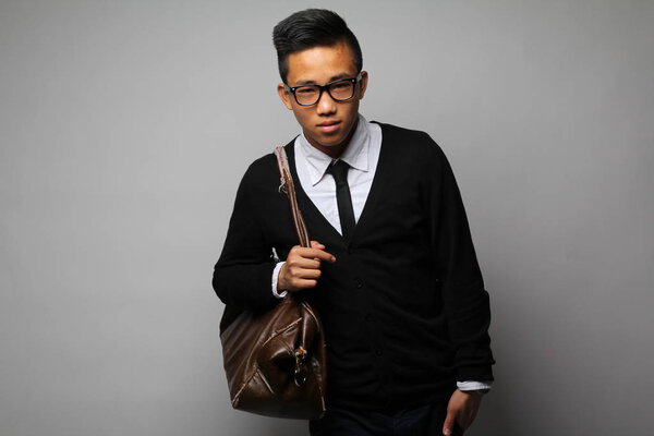 Asian young guy with bag