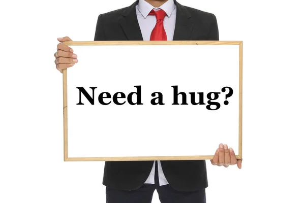 Empresário Está Segurando Quadro Negro Com Palavra Preciso Abraço — Fotografia de Stock