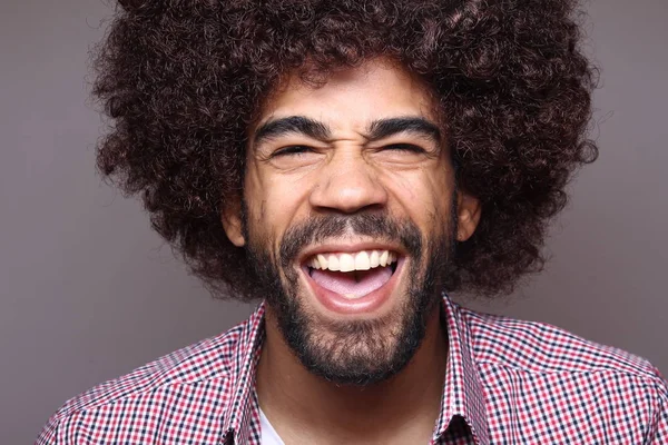 Happy black man with big hair