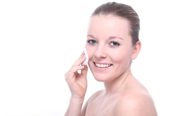 Young Blonde Girl Cleaning Her Face Royalty Free Stock Images