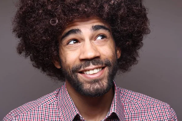 Happy black man with big hair