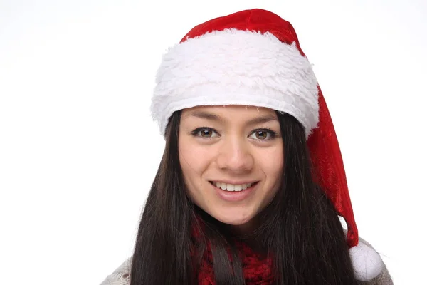 幸せな若いアジア女の子はクリスマスの帽子を着ています — ストック写真