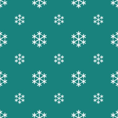 Yeşil arka planda kesintisiz beyaz kar tanesi