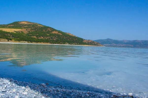 Turquoise lake Salda Burdur Turkey. White mineral rich beach.