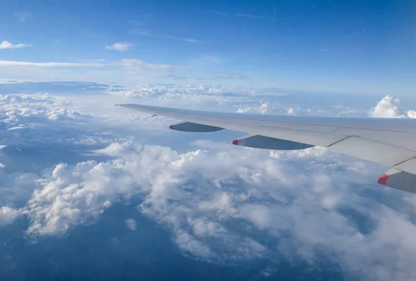 Beautiful view of clouds and sky from a plane window