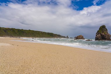 Batı yakası kayalık plajı, Cape Foulwind, Westport, Yeni Zelanda, Yeni Zelanda 'da inanılmaz bir pelerin faul rüzgarı plajı.
