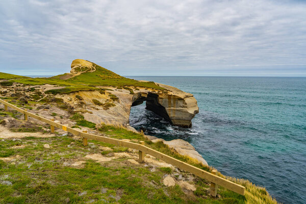 beautiful tunnel beach in New Zealand, Tunnel beach surrounded by rocks, Dunedin, South island of New Zealand