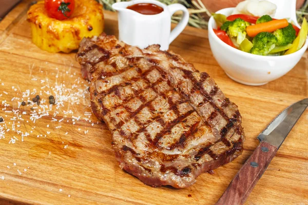 Grilled steak with sauces, fresh vegetable salad and mashed potatoes Georgian recipe. National cuisine
