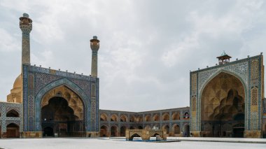 Historic Imam Mosque at Naghsh-e Jahan Square, Isfahan,Iran. Construction began in 1611 and is one of the masterpieces of Persian architecture in the Islamic era clipart