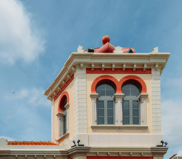 Moorish architectural facade of the traditional market consisting of family run stalls selling local grown or sourced produce which include fish, fabrics and gifts