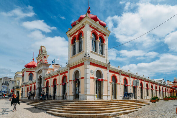 Moorish architectural facade of the traditional market consisting of family run stalls selling local grown or sourced produce which include fish, fabrics and gifts