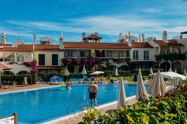 Poolside at the at the Old Village, a tranquil setting in The Algarve, surrounded by the Pinhal Golf Course and close to pristine beaches