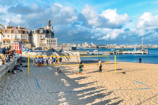 Seaside cityscape of Praia da Ribeira, Cascais. Intimate beach near the train station and popular with tourists