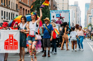 New York, USA - June 24, 2018: The annual New York City LGBT Pride March, or New York City Pride March, traverses southward down Fifth Avenue and ends at Greenwich Village in Lower Manhattan clipart