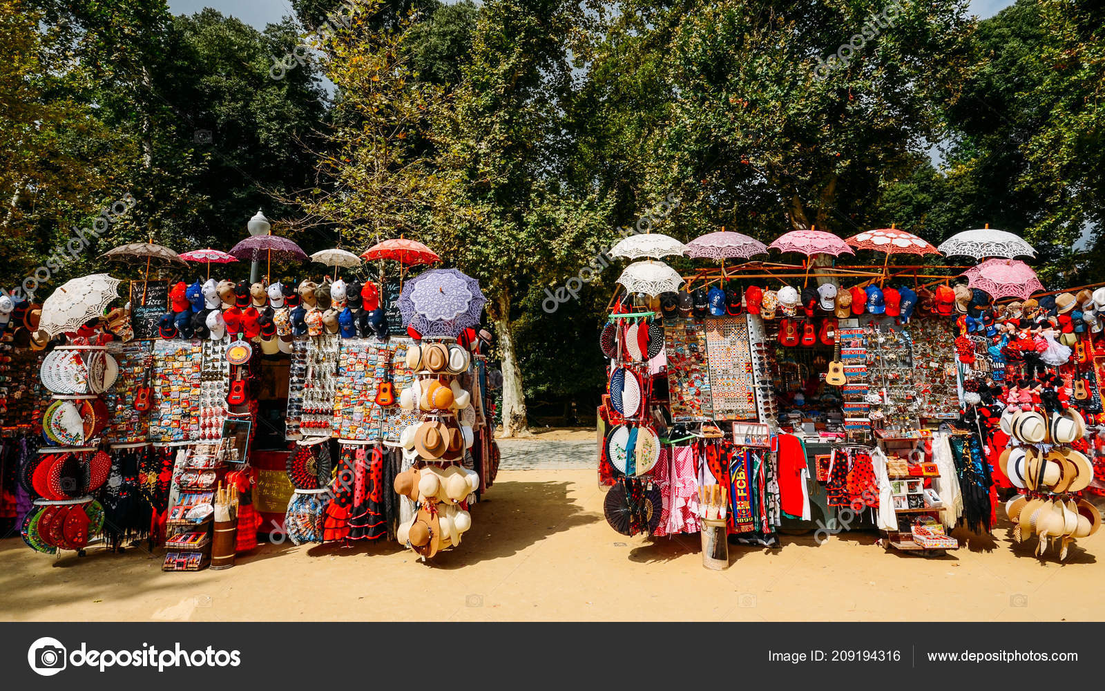 SEVILLE, SPAIN - NOVEMBER 19, 2014: Sale Of Souvenirs In Seville Near Plaza  De Espana. Seville, Andalusia Stock Photo, Picture and Royalty Free Image.  Image 35780662.