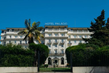 Front facade of the famous Hotel Palacio which was frequented by both German and Allied spies during WWII, as well as Ian Fleming, cerator of James Bond clipart