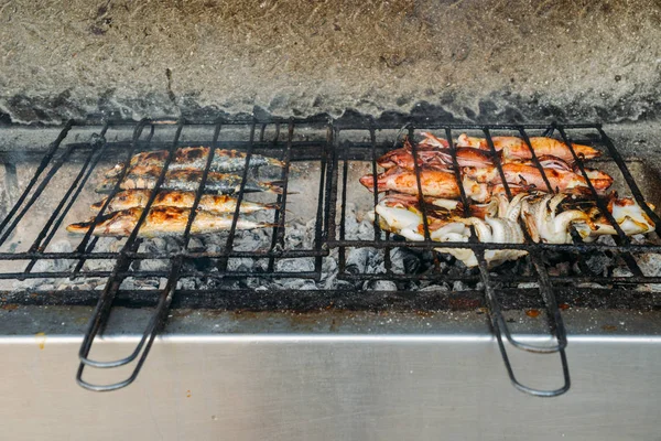 Grilled salty mackerel fish on the grill closeup — Stock Photo, Image