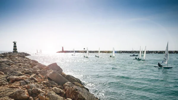 International sailors in wind sailing boats entering Vilamoura Marina, Portugal — Stock Photo, Image