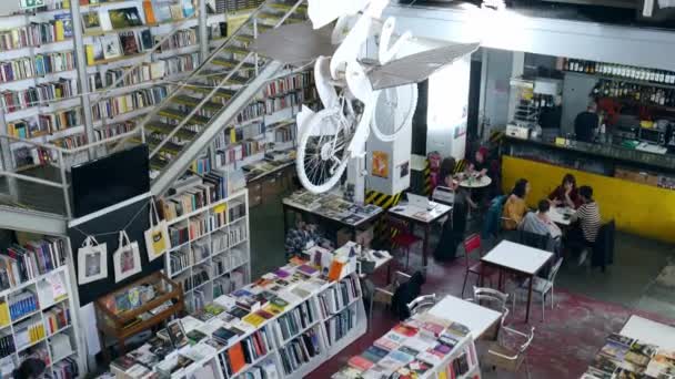 Pan up of Ler Devagar bookstore in the artsy LX Factory complex in Alcantara, Lisbon — Stock Video