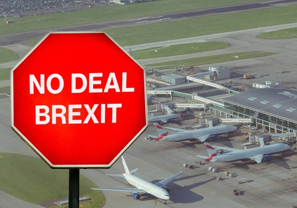 No Deal Brexit digital composite sign with high perspective view of airport terminal in background