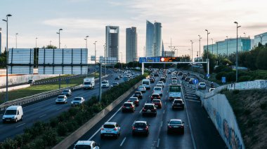 Heavy commuter highway traffic in Madrid, Spain clipart