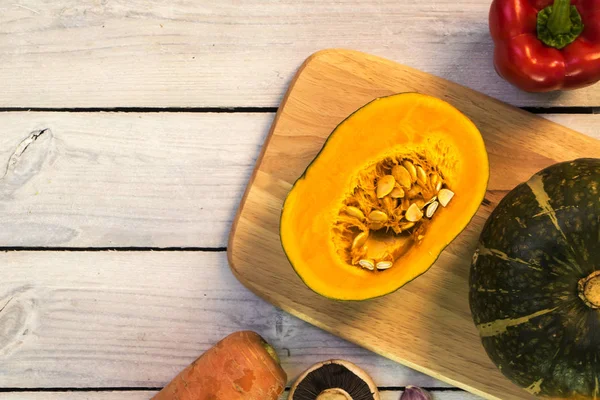 fresh sweet pumpkin on  cutting board