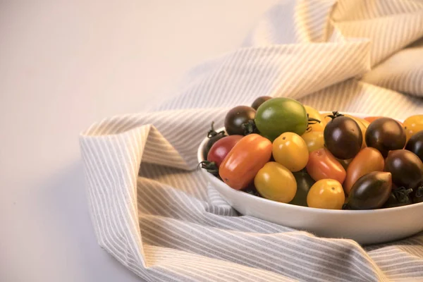 fresh cherry tomato on white background