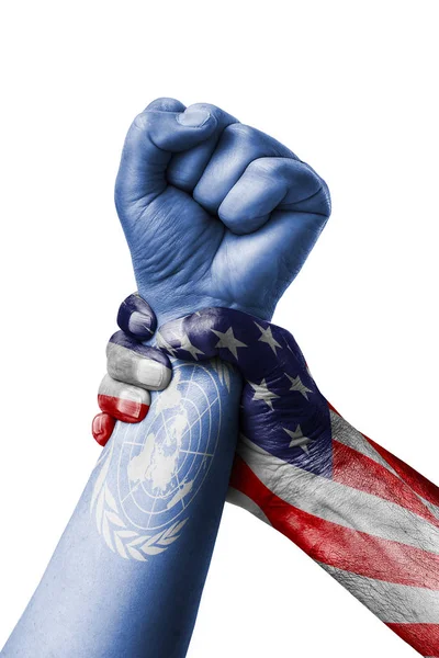 AMERICAN VS United nations, Fist painted in colors of United nations flag, fist flag, country of United nations