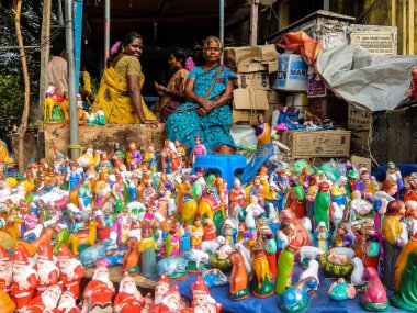 Pondicherry, India - December, 26th, 2017. New year and christmas toys on the steet market in Pondicherry. clipart