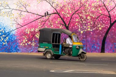 Vijayawada, India - Circa January, 2018. Rickshaw cab on the street of Vijayawada, India. clipart