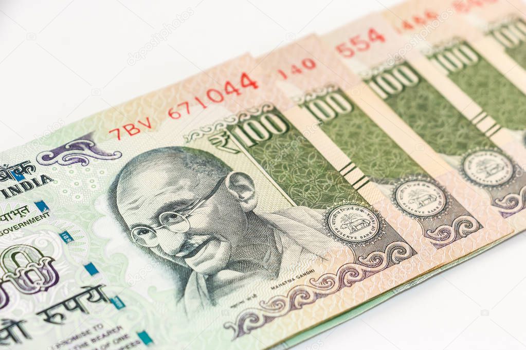 Close up view of brand new indian 100 rupees banknotes.