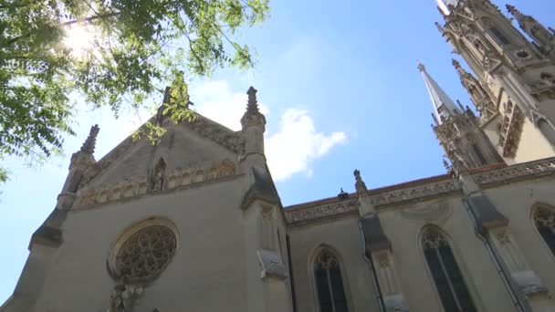 Old Gothic Cathedral Summer Day Blue Sky Pan Shot — Stock Video
