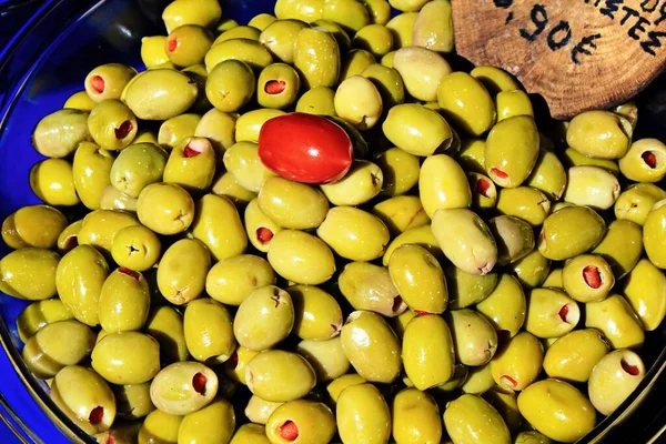 Stall with Greek olives at street market in Athens, Greece, May 18 2019.