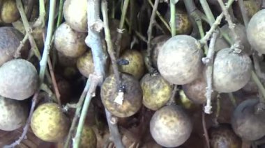 bunch of longan on the basket