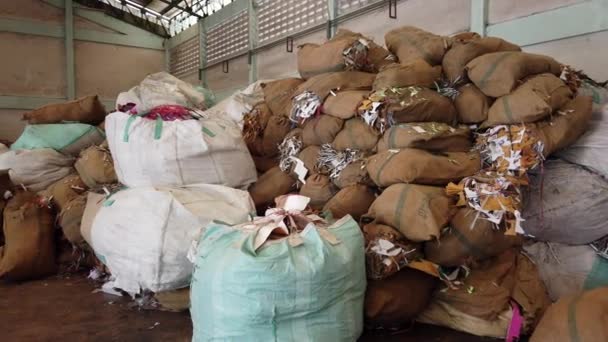 Pile of paper, wastepaper in bag and sack ready for recycle — Stock Video