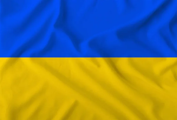 Barva Ukrajiny národní vlajka na přehozeném textilu, pozadí — Stock fotografie