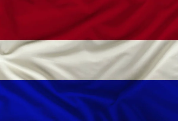 La bandera de color del estado de Holanda se representa en textiles con pliegues suaves — Foto de Stock