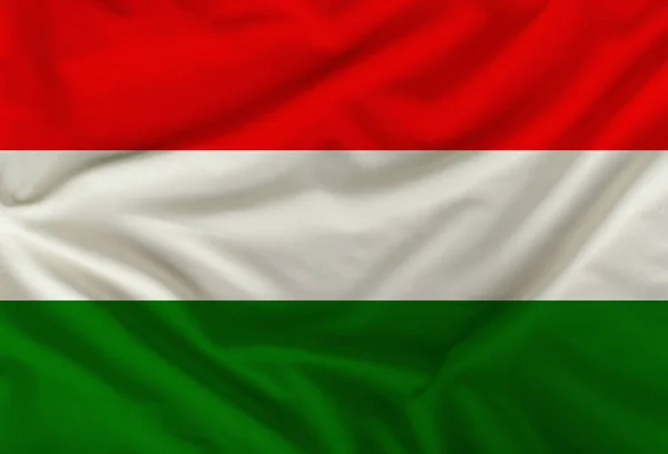 Bandera de color del estado de Hungría representada en textiles con pliegues suaves — Foto de Stock